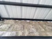 Custom metal awning frame fabrication and welded supports.
