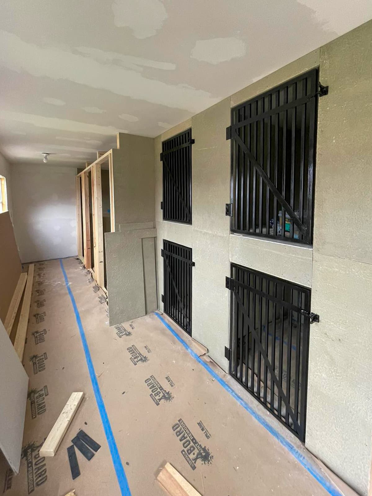 Custom metal door fabrication with welded frame details.
