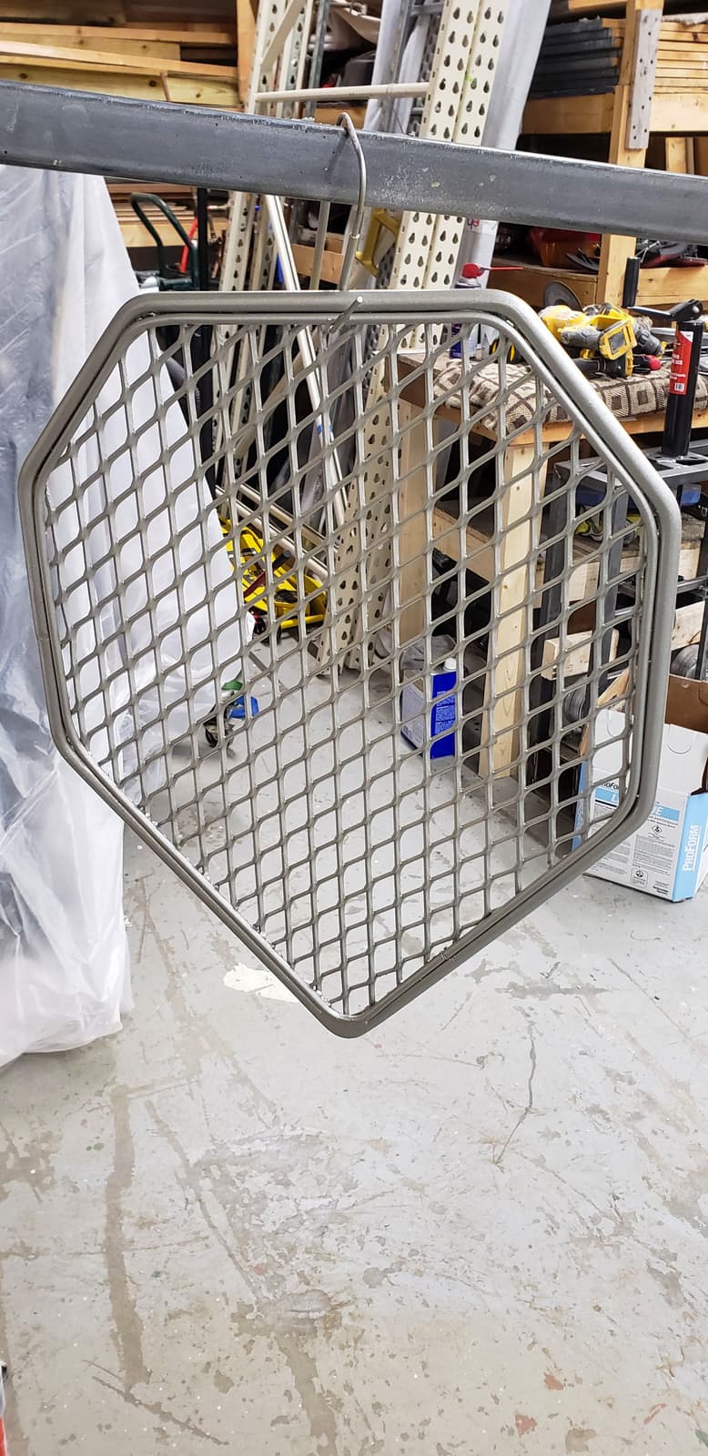 Ornamental iron-style metal fabrication for residential details.