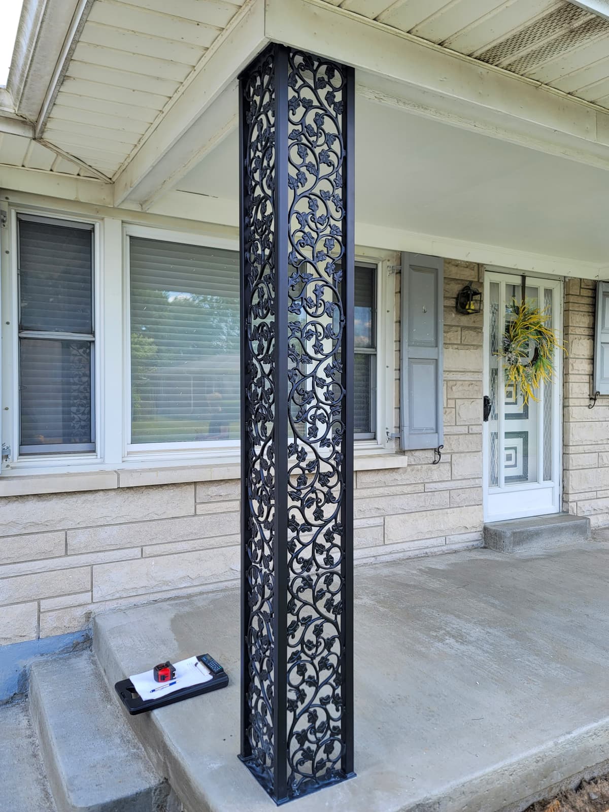 Decorative metal fabrication with ornamental welded pattern.
