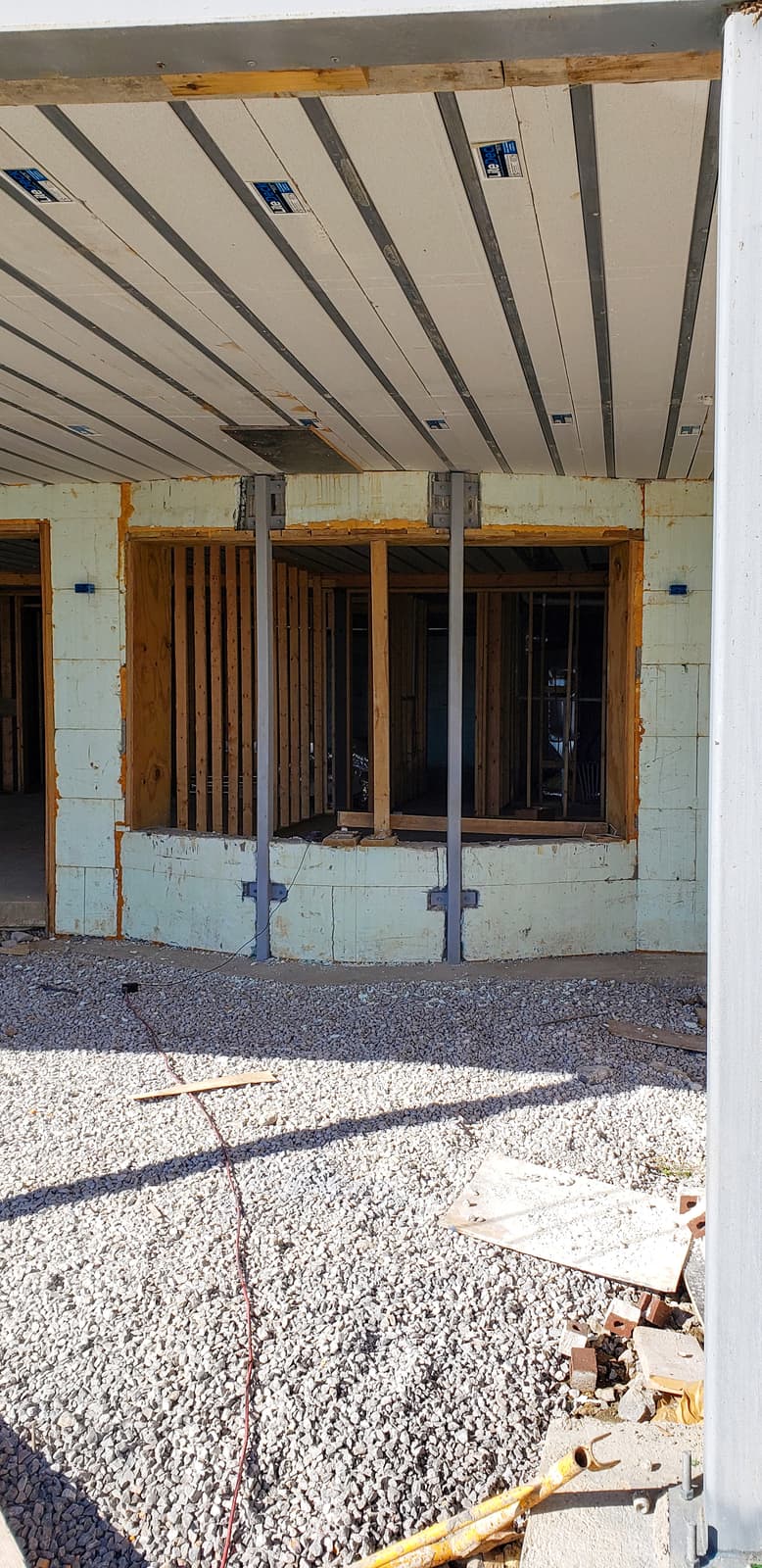 Shop-fabricated steel prepared for structural installation.