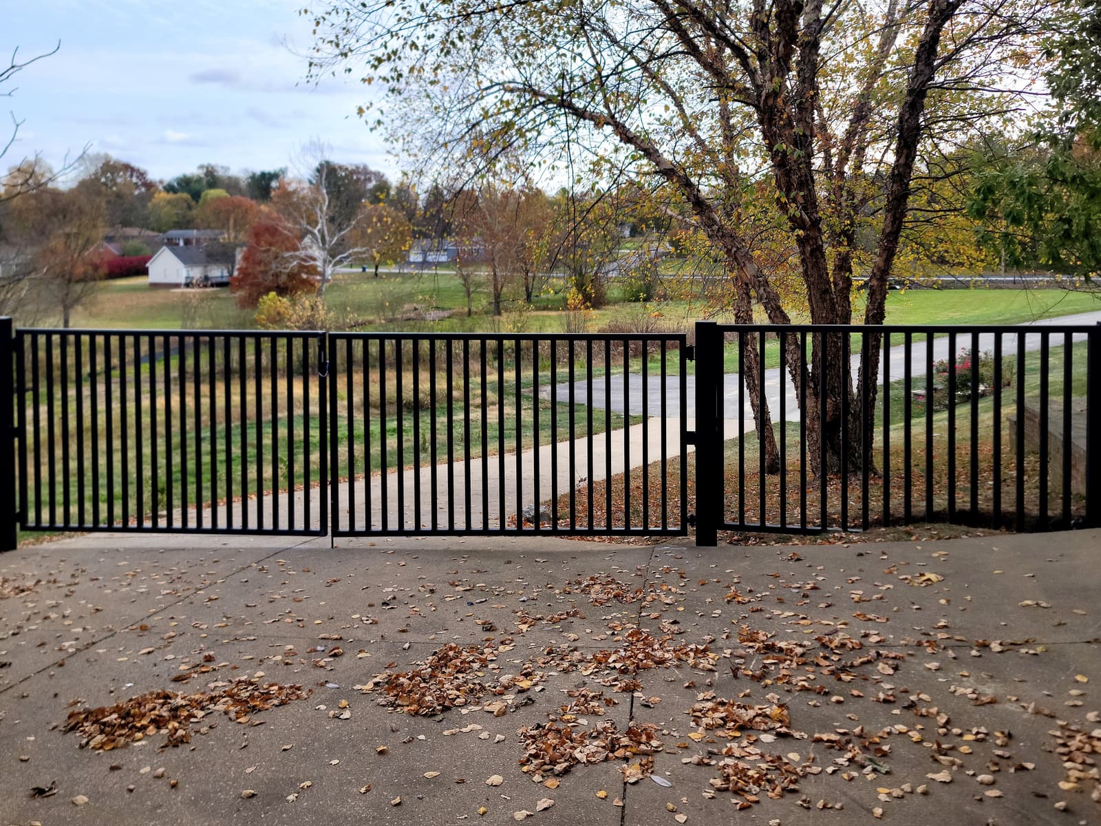 Custom metal gate fabrication with black welded pickets.