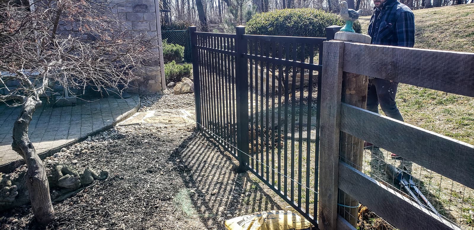 Metal pedestrian pool safety gate installation in Central Kentucky.