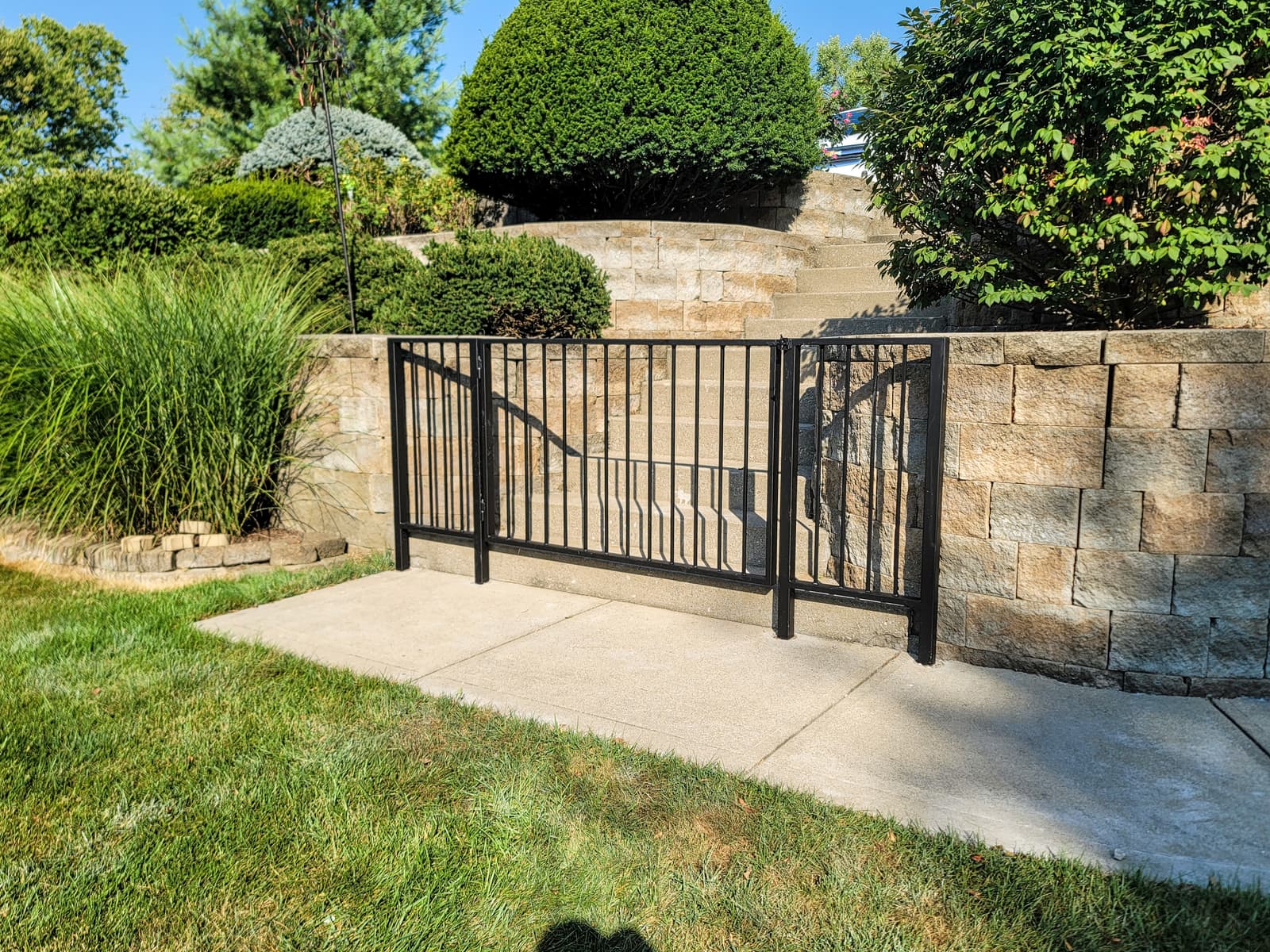 Metal pedestrian gate project with welded frame and pickets.