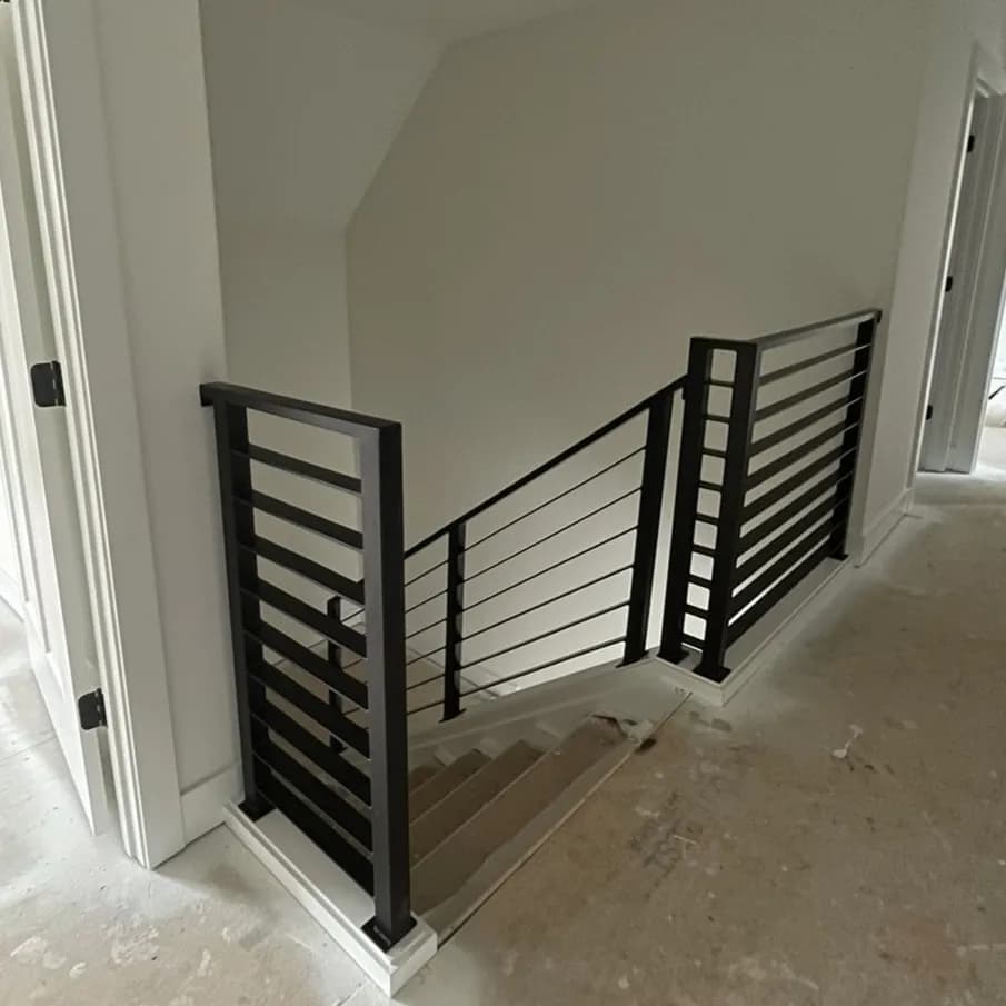 Interior or exterior stair metal railing with painted finish in Lexington, KY.